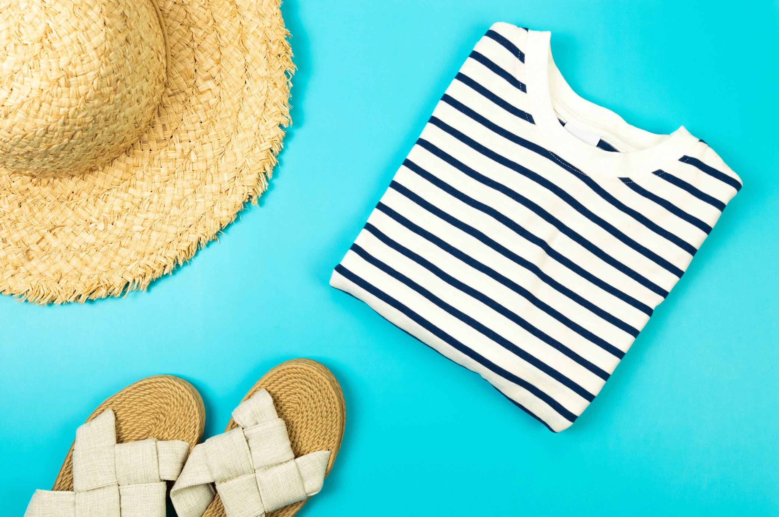Striped t-shirt flat lay with summer accessories