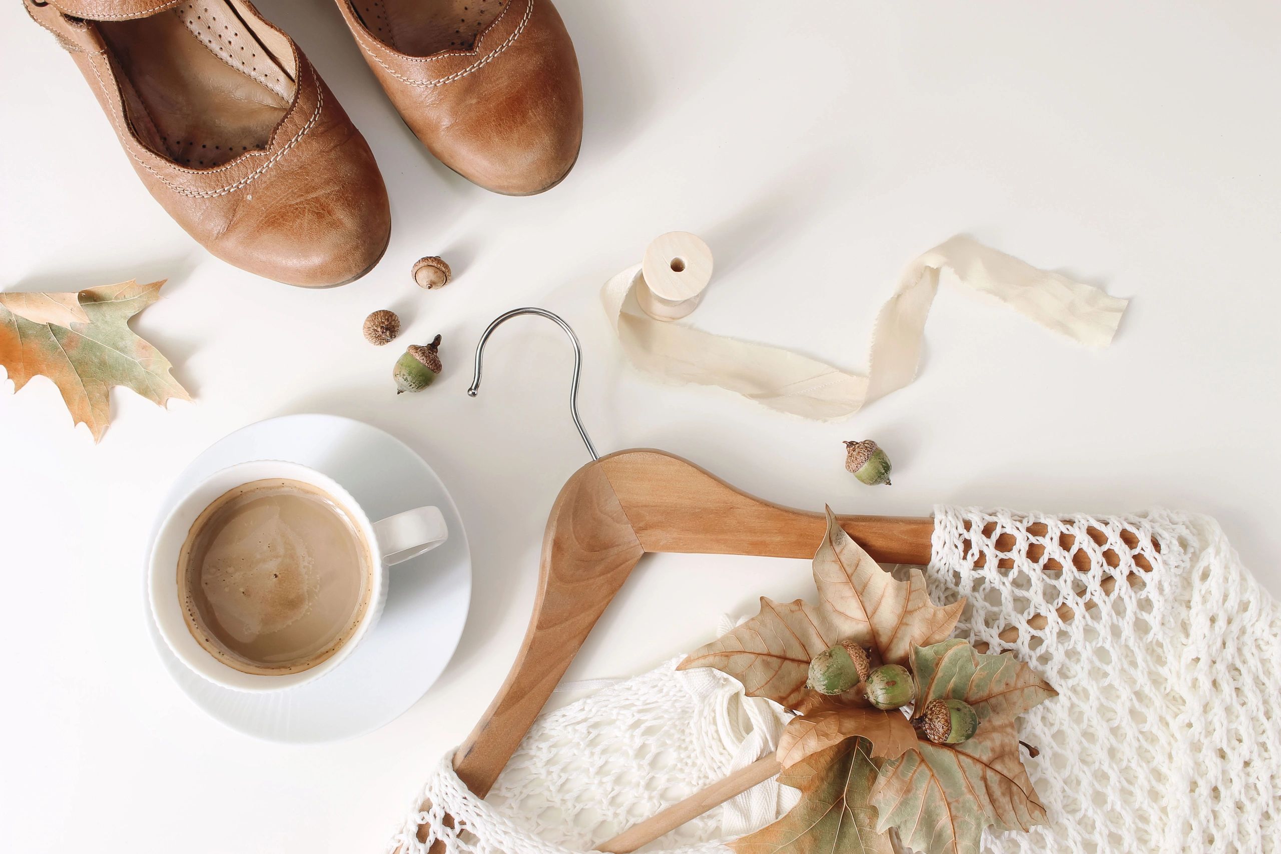 Neutral fashion accessories flat lay