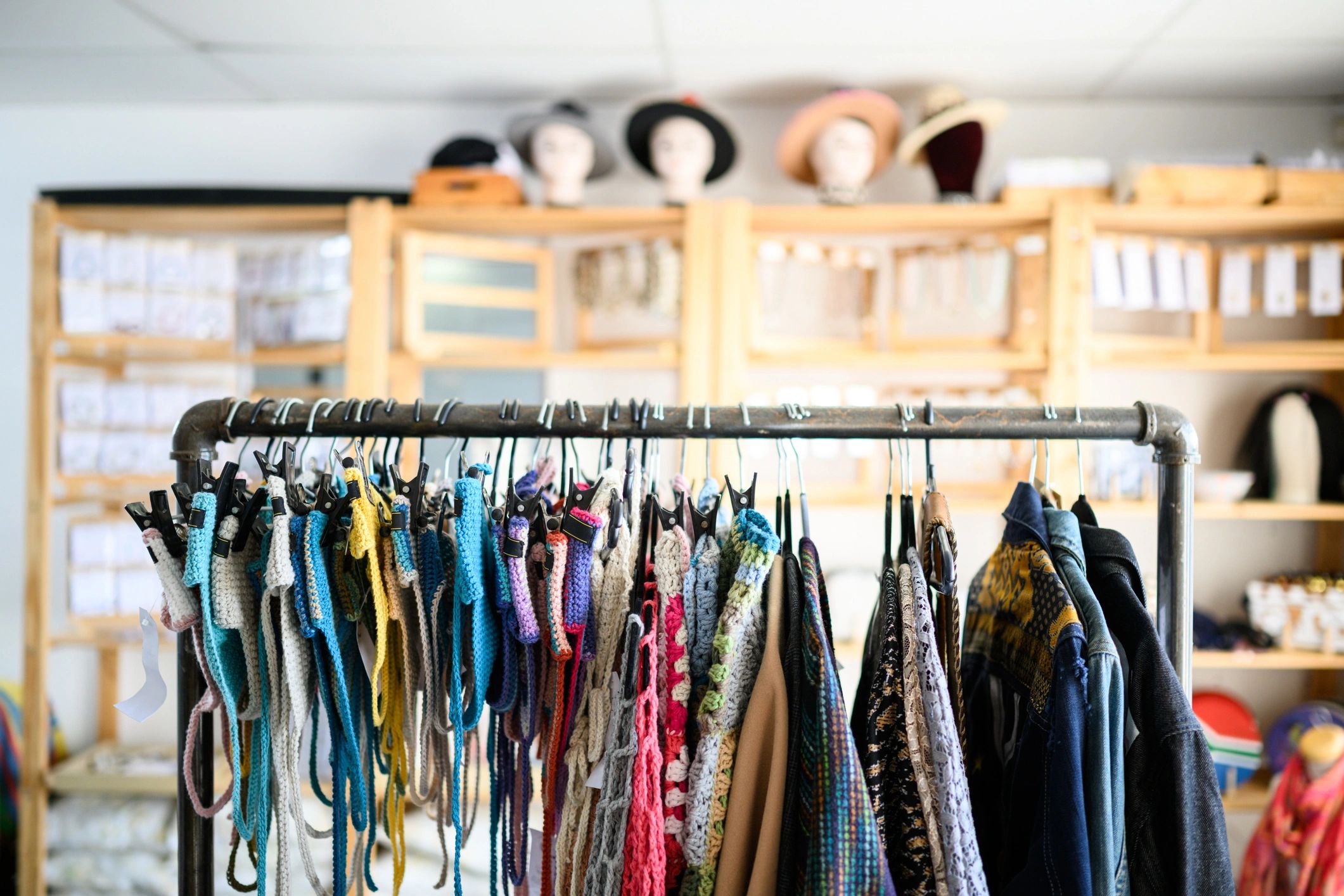 Clothing rack in a boutique with colorful garments