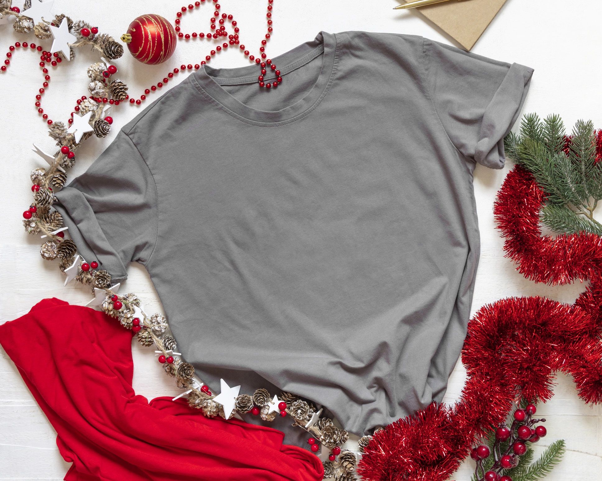 Blank gray t-shirt mockup on a wooden surface